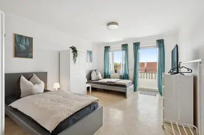 Ein Bett oder Betten in einem Zimmer der Unterkunft Monteurswohnung Wörrstadt mit Balkon