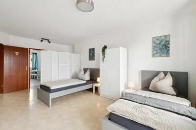 Ein Bett oder Betten in einem Zimmer der Unterkunft Monteurswohnung Wörrstadt mit Balkon