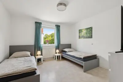 Ein Bett oder Betten in einem Zimmer der Unterkunft Monteurswohnung Wörrstadt mit Balkon