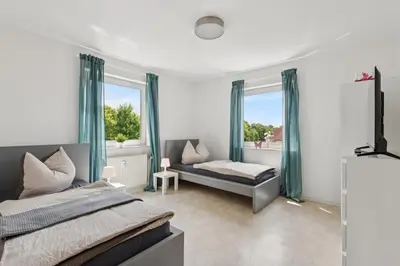 Ein Bett oder Betten in einem Zimmer der Unterkunft Monteurswohnung Wörrstadt mit Balkon