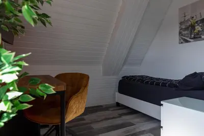Ein Sitzbereich in der Unterkunft NECKARWESTHEIMER Hotel