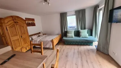 Ein Bett oder Betten in einem Zimmer der Unterkunft Haides helle Wohnung