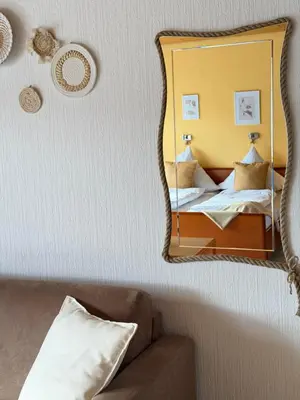 Ein Bett oder Betten in einem Zimmer der Unterkunft Hotel Garni Sebastian