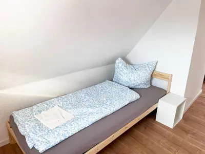 Ein Bett oder Betten in einem Zimmer der Unterkunft Modern and Cozy Apartment in Ludwigsburg