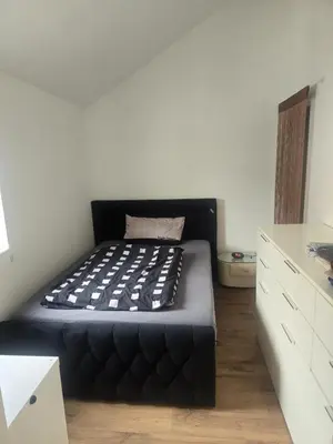 Ein Bett oder Betten in einem Zimmer der Unterkunft Monteur- und Ferienunterkunft Worms