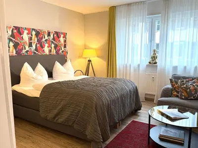 Ein Bett oder Betten in einem Zimmer der Unterkunft Dompanorama PAPAGENO 1-Zimmer Apartment für 2 Gäste
