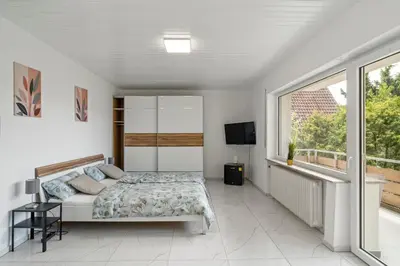 Ein Bett oder Betten in einem Zimmer der Unterkunft Business & Travel Apartment - Top Lage - 20 Min vom Frankfurt Airport