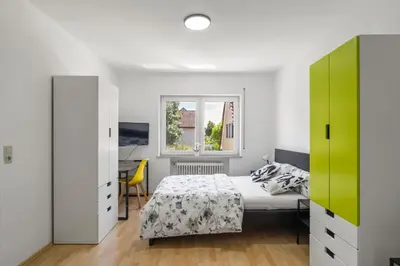 Ein Bett oder Betten in einem Zimmer der Unterkunft Business & Travel Apartment - Top Lage - 20 Min vom Frankfurt Airport