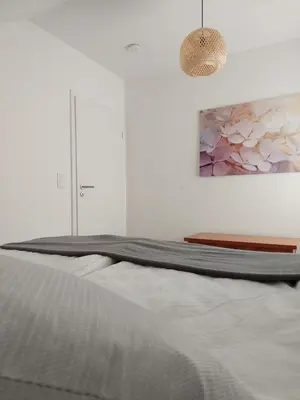 Ein Bett oder Betten in einem Zimmer der Unterkunft Ferienwohnung Senfnest