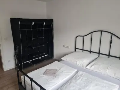 Ein Bett oder Betten in einem Zimmer der Unterkunft Monteurwohnung Pforzheim mit Balkon - QuartierPro