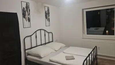 Ein Bett oder Betten in einem Zimmer der Unterkunft Monteurwohnung Pforzheim mit Balkon - QuartierPro