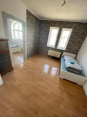 Ein Bett oder Betten in einem Zimmer der Unterkunft Monteurwohnung Erdgeschoss Birkenfeld - Karlsruhe 25min