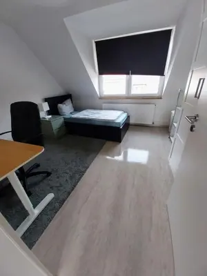 Ein Sitzbereich in der Unterkunft Monteurwohnung - Bertholdstraße 19