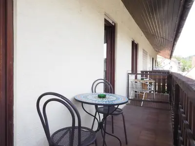 Ein Balkon oder eine Terrasse in der Unterkunft Nibelungen-Stubb mit einer Gemeinschaftsküche