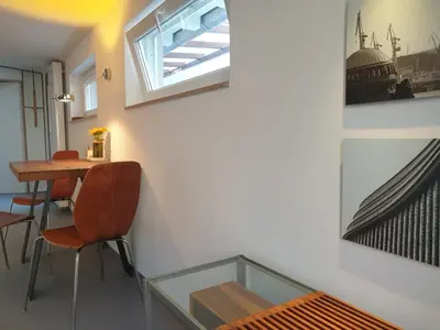Ein Sitzbereich in der Unterkunft Fenster zum Hof