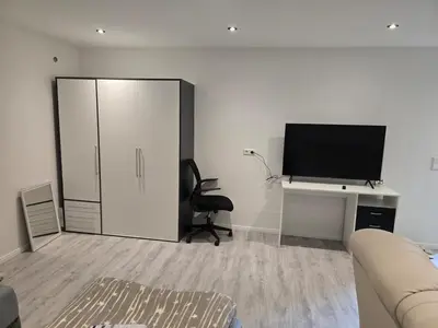 TV/Unterhaltungsangebot in der Unterkunft 1-Zimmer Woh Souterrainwohnung