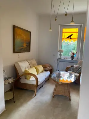 Ein Sitzbereich in der Unterkunft Haus Stoll