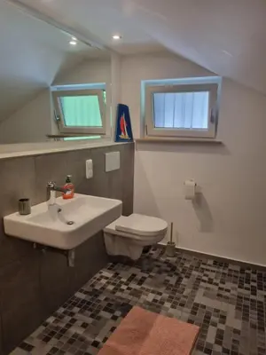 Ein Badezimmer in der Unterkunft Charlottes Waldresidenz