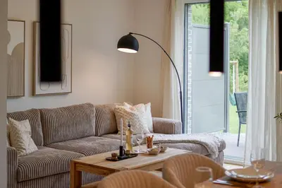 Ein Sitzbereich in der Unterkunft Wohnkultur - Ferienhaus für 10 mit Garten und 5 Schlafzimmern