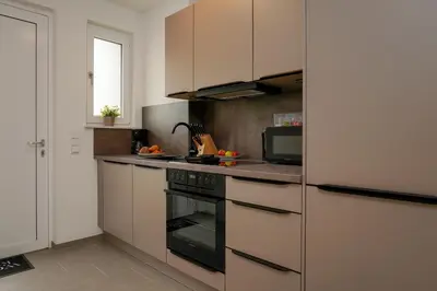Küche/Küchenzeile in der Unterkunft Wohnkultur - Ferienhaus für 10 mit Garten und 5 Schlafzimmern