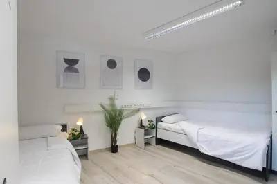 Ein Bett oder Betten in einem Zimmer der Unterkunft MZK Maier LongStay Central