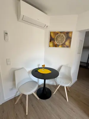 Ein Sitzbereich in der Unterkunft Ferienwohnung Lemon - Suite