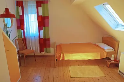Ein Bett oder Betten in einem Zimmer der Unterkunft Ferienwohnung Trautes Heim