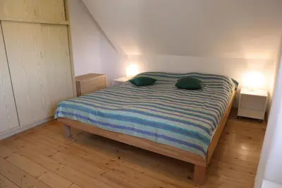 Ein Bett oder Betten in einem Zimmer der Unterkunft Ferienwohnung Trautes Heim