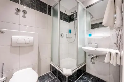 Ein Badezimmer in der Unterkunft Hotel Krone