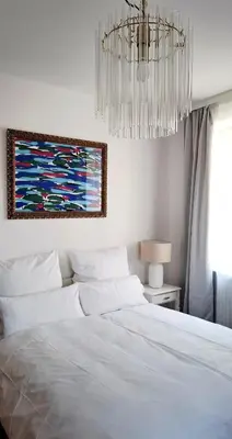 Ein Bett oder Betten in einem Zimmer der Unterkunft Suite D