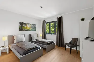 Ein Bett oder Betten in einem Zimmer der Unterkunft Moderne Monteursunterkunft