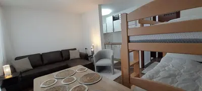Ein Bett oder Betten in einem Zimmer der Unterkunft NEU Casa Ludi Pforzheim Eutingen gute Wohngegend direkte Buchung möglich keine Freigabe erforderlich inklusive Balkon Terrasse und Tiefgaragenparkplatz im Haus
