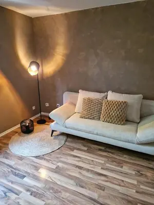 Ein Sitzbereich in der Unterkunft Dorey Home HN2 - Zentral gelegen