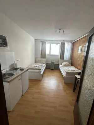 Ein Bett oder Betten in einem Zimmer der Unterkunft Room in Darmstadt City