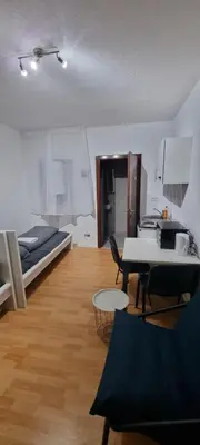 Ein Bett oder Betten in einem Zimmer der Unterkunft Room in Darmstadt City