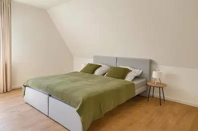 Ein Bett oder Betten in einem Zimmer der Unterkunft Hotel weisses Lamm
