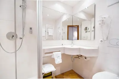 Ein Badezimmer in der Unterkunft Hotel Avisa