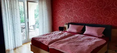 Ein Bett oder Betten in einem Zimmer der Unterkunft Ferienwohnung Catus
