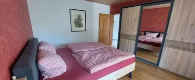 Ein Bett oder Betten in einem Zimmer der Unterkunft Ferienwohnung Catus
