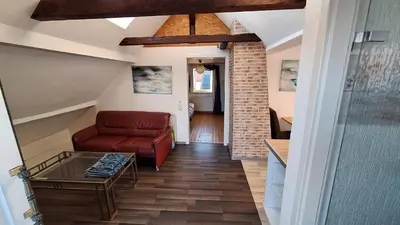 Ein Sitzbereich in der Unterkunft Cozy apartment with S-Bahn connection to Frankfurt