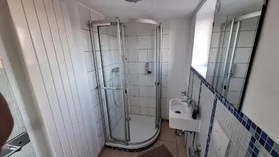 Ein Badezimmer in der Unterkunft Cozy apartment with S-Bahn connection to Frankfurt
