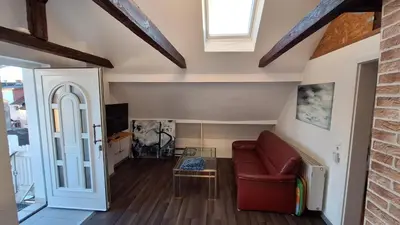 Ein Sitzbereich in der Unterkunft Cozy apartment with S-Bahn connection to Frankfurt