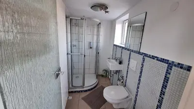 Ein Badezimmer in der Unterkunft Cozy apartment with S-Bahn connection to Frankfurt