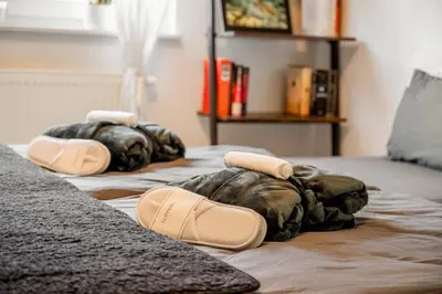 Ein Bett oder Betten in einem Zimmer der Unterkunft Retreat Living Bensheim - Sauna - Garten - Parkplatz