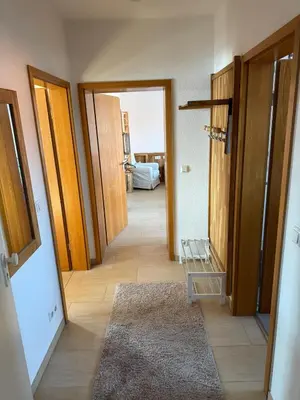 Ein Bett oder Betten in einem Zimmer der Unterkunft Stilvolle Wohnung mit Parkplatz