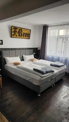 Ein Bett oder Betten in einem Zimmer der Unterkunft Beim Alfred