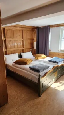 Ein Bett oder Betten in einem Zimmer der Unterkunft Beim Alfred