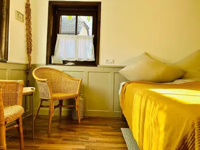 Ein Bett oder Betten in einem Zimmer der Unterkunft Gästezimmer Emil&Frieda