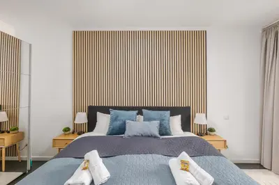 Ein Bett oder Betten in einem Zimmer der Unterkunft Kalina Suites - Apartment am Rhein, Nähe BASF, AbbVie, Uni MA
