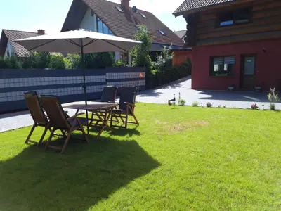 Ein Garten an der Unterkunft Ferienwohnung im Herzen des Pfälzer Waldes